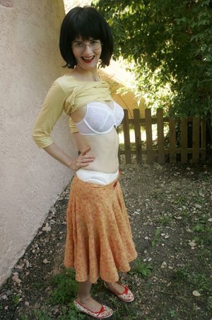 18 tear old schoolgirl Tiff Bannister takes selfies while disrobing in bedroom